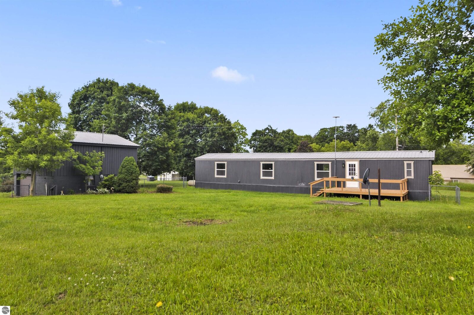 Property Photo:  202 Jenny Lind Street  MI 49688 