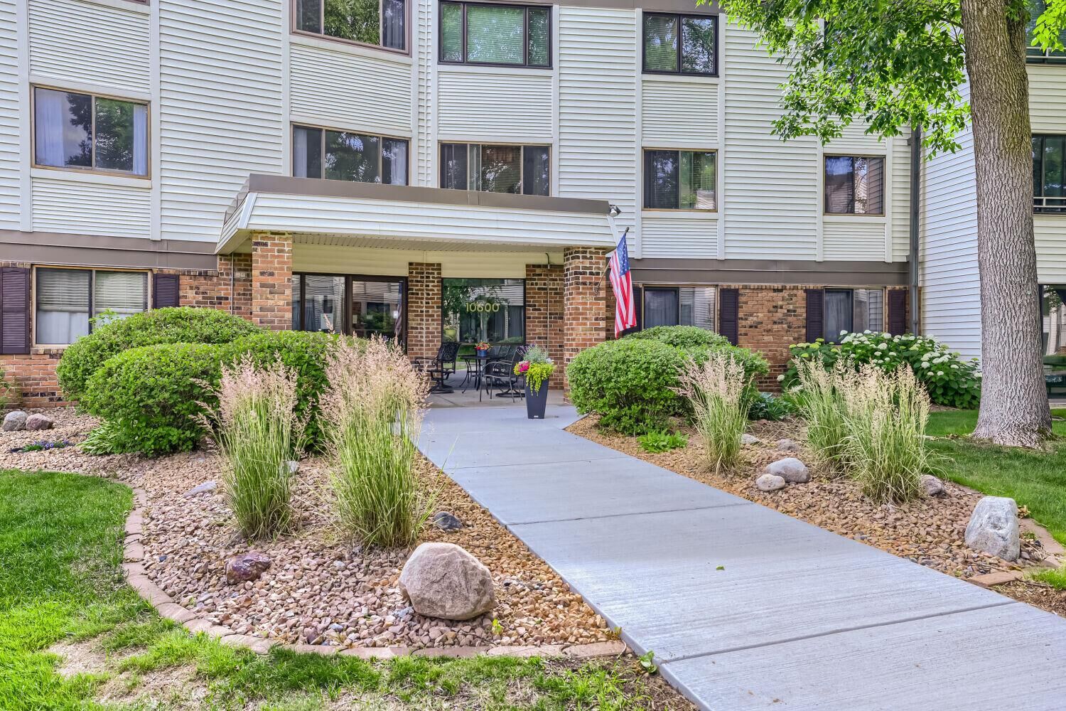 Property Photo:  10600 43rd Avenue N 202  MN 55442 