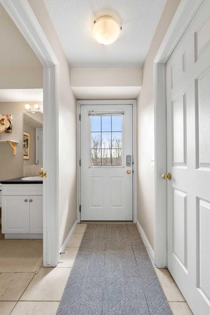 Property Photo: 45 N Railway Street 207 AB T1S 1J3