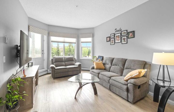 Property Photo: 8 Prestwick Pond Terrace SE 220 AB T2Z 4P3