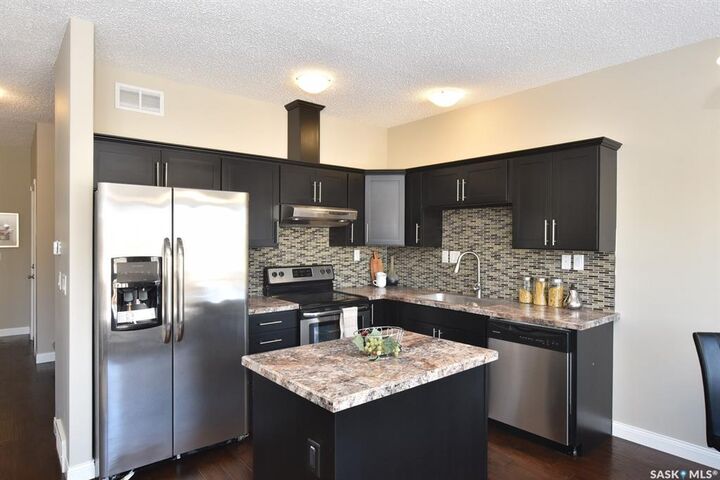 Property Photo:  14 McKenzie Lane  SK S4L 0B2 