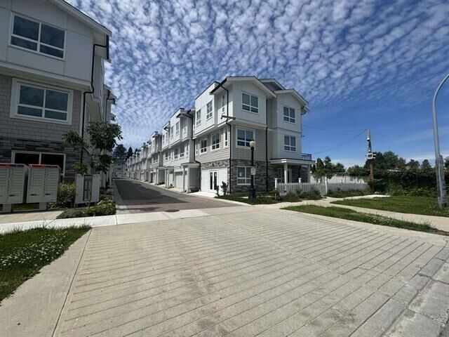 Property Photo: 8181 135A Street 28 BC V3W 3N8