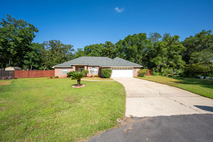 Property Photo:  6900 Calle De Caballero  FL 32566 
