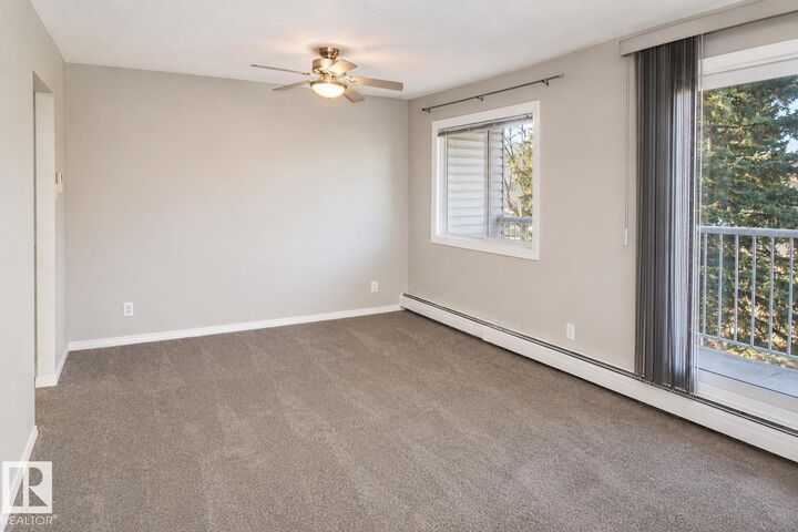 Property Photo: 5125 Riverbend Road NW 223 AB T6H 5K5