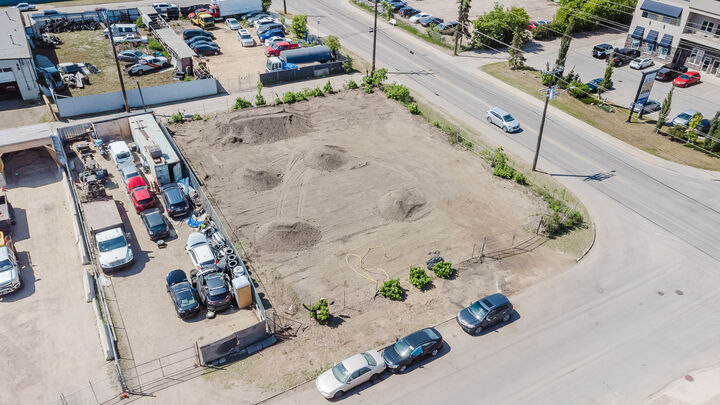 Property Photo:  129 Avenue NW  AB T5A 0A3 