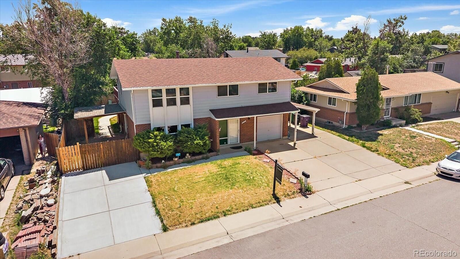 Property Photo:  5042 Scranton Street  CO 80239 
