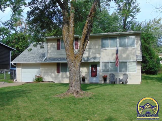 Property Photo:  3501 SW Oakley Ave  KS 66614 