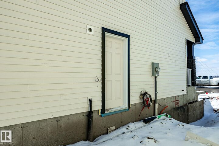 Property Photo: 15647 2 Street NE AB T5Y 6K8