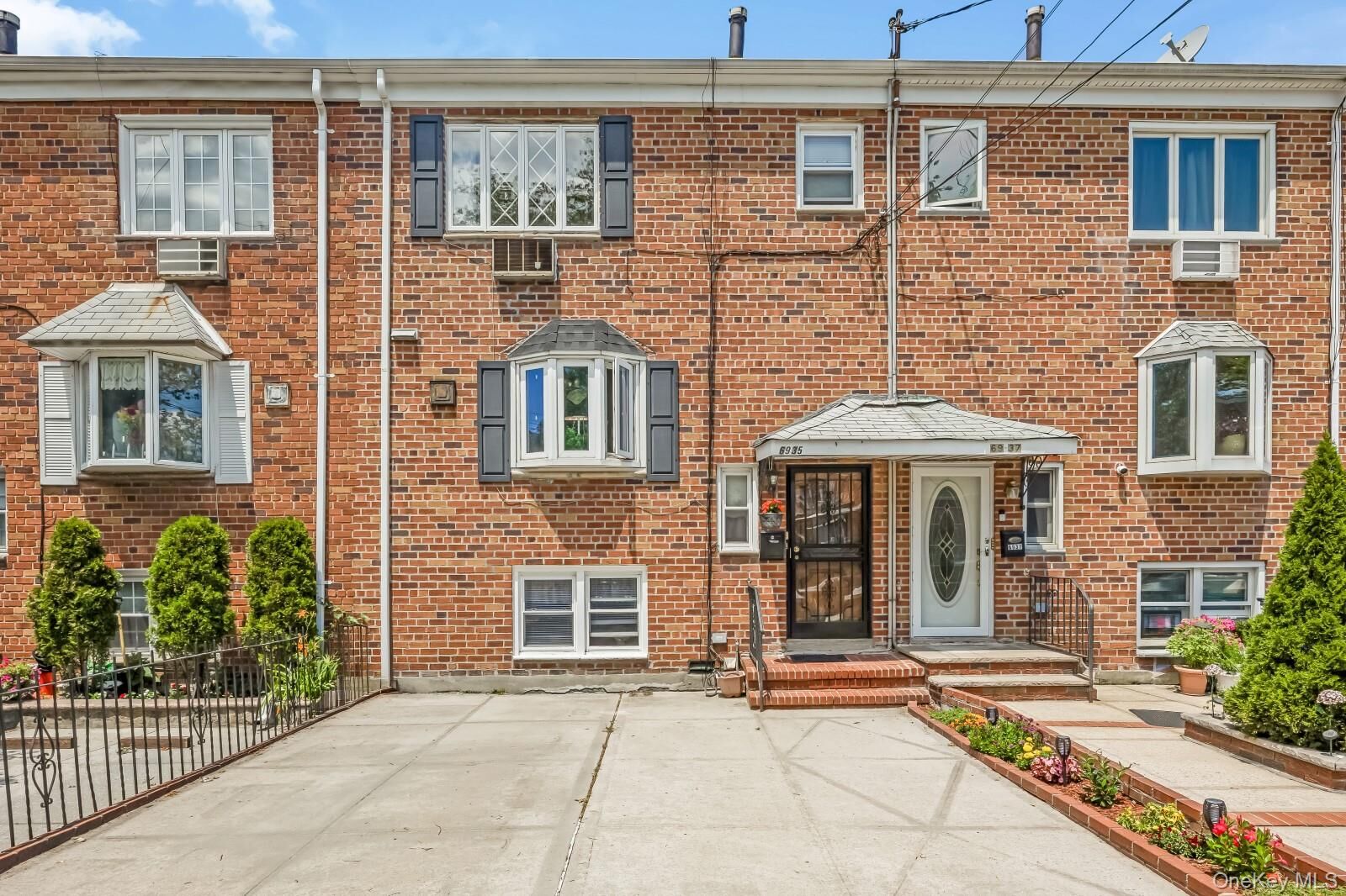 Property Photo: 69-35 61st Road NY 11379