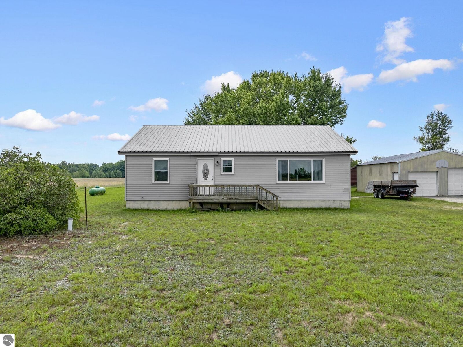 Property Photo:  6268 E M-72  MI 49646 