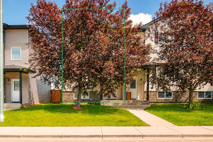 Property Photo: 312 17 Street E AB T1R 1R2