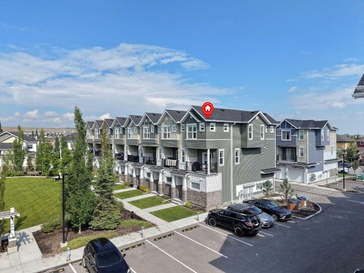 Property Photo: 115 Sagewood Drive SW 809 AB T4B 4V5