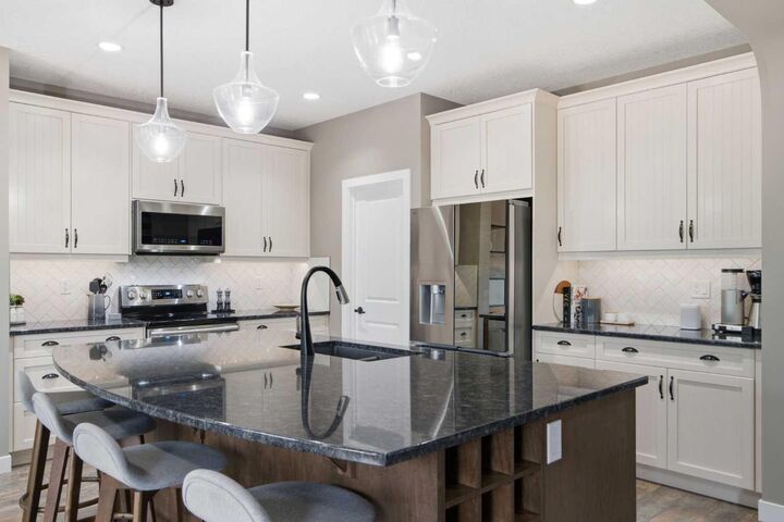 Property Photo: 300 Aspenmere Way AB T1X 0Y2