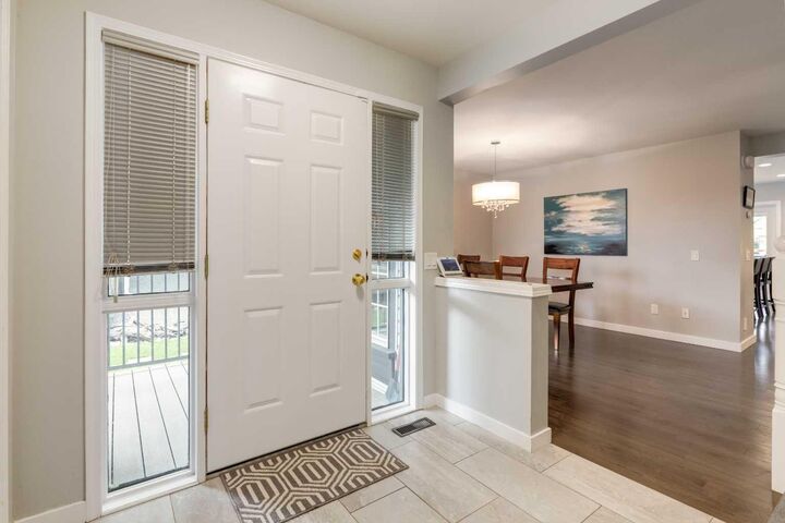 Property Photo:  128 Riverwood Close SE  AB T2C 3Z6 