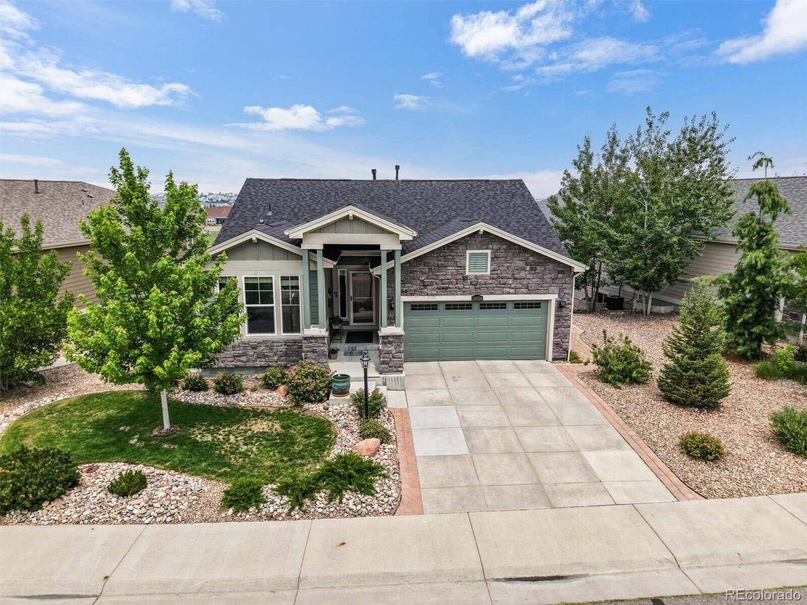 Property Photo:  14924 Rosemary Street  CO 80602 