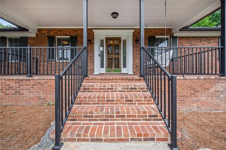 Property Photo:  1744 Huntington Woods Court  NC 27103 