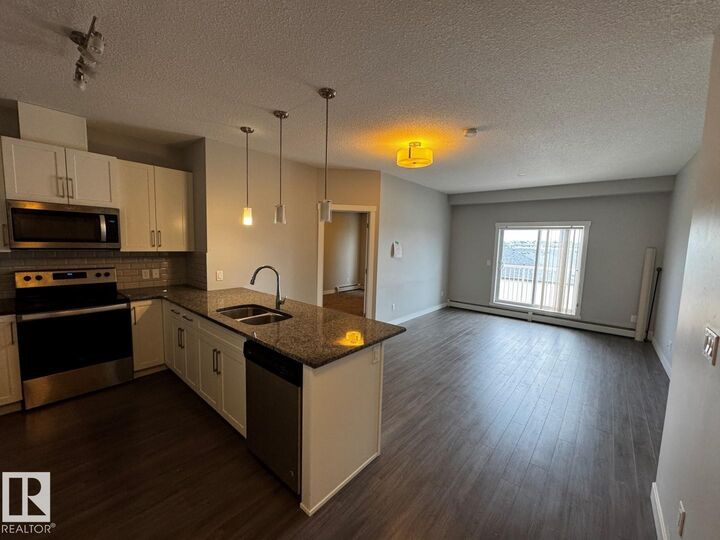 Property Photo: 3670 139 Avenue NW 405 AB T5Y 3N5