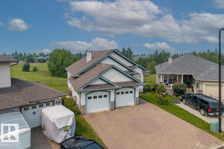 Property Photo: 215 Westerra Point(E) AB T7Z 2W9