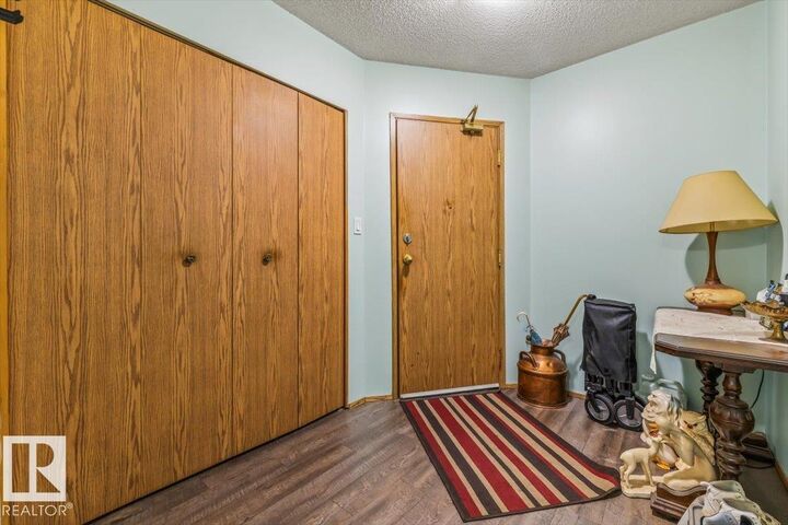 Property Photo: 9985 93 Ave 303 AB T8L 1N5