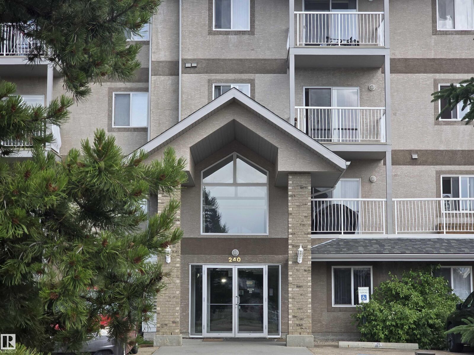 Property Photo: 240 Spruce Ridge Road 204 AB T7X 0G5