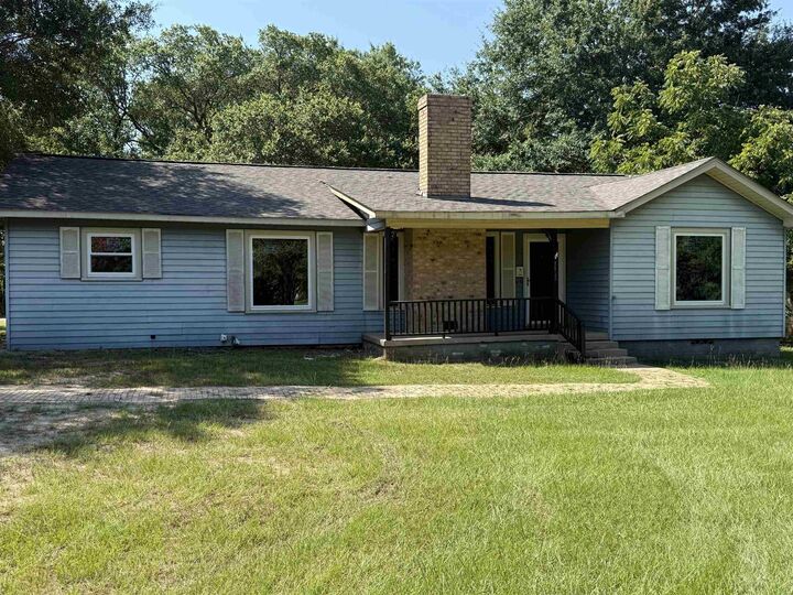 Property Photo:  1602 E Main  TX 75652 