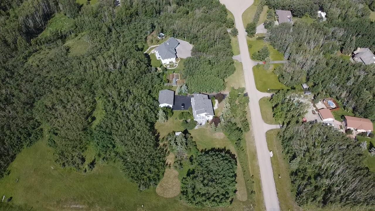 Property Photo:  31 Biggar Heights Bay  AB T3R 1H4 