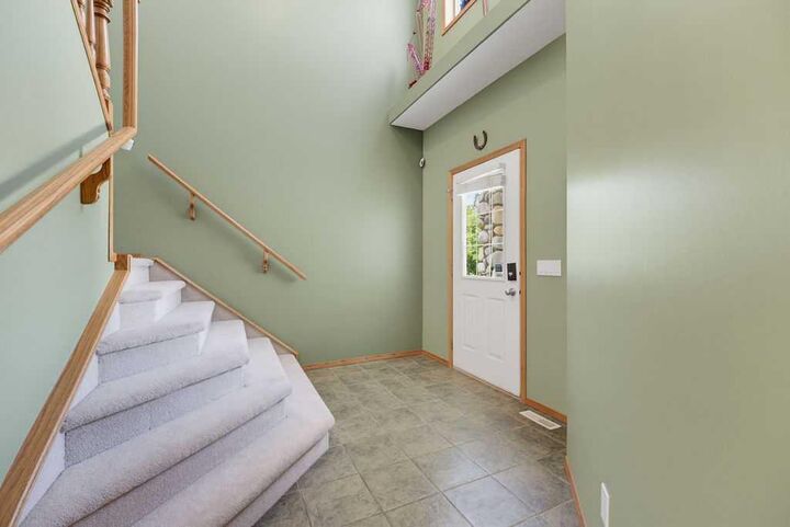 Property Photo: 11 Bow Ridge Link AB T4C 1V7