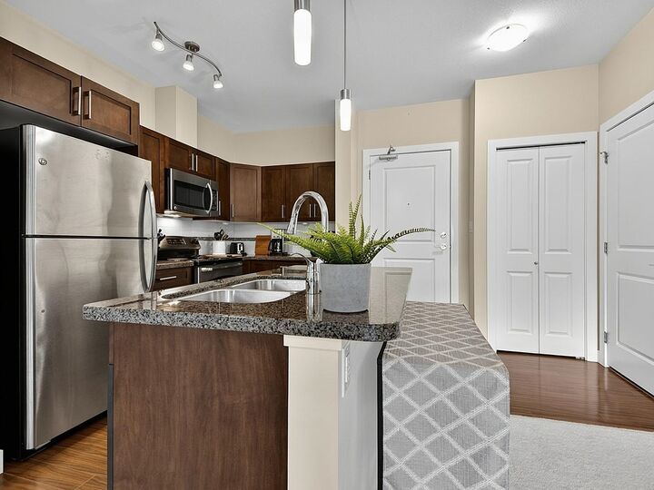 Property Photo: 33898 Pine Street 404 BC V2S 2P3