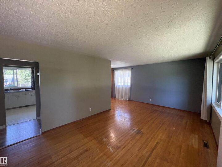 Property Photo:  13032 90 St NW  AB T5E 3M3 