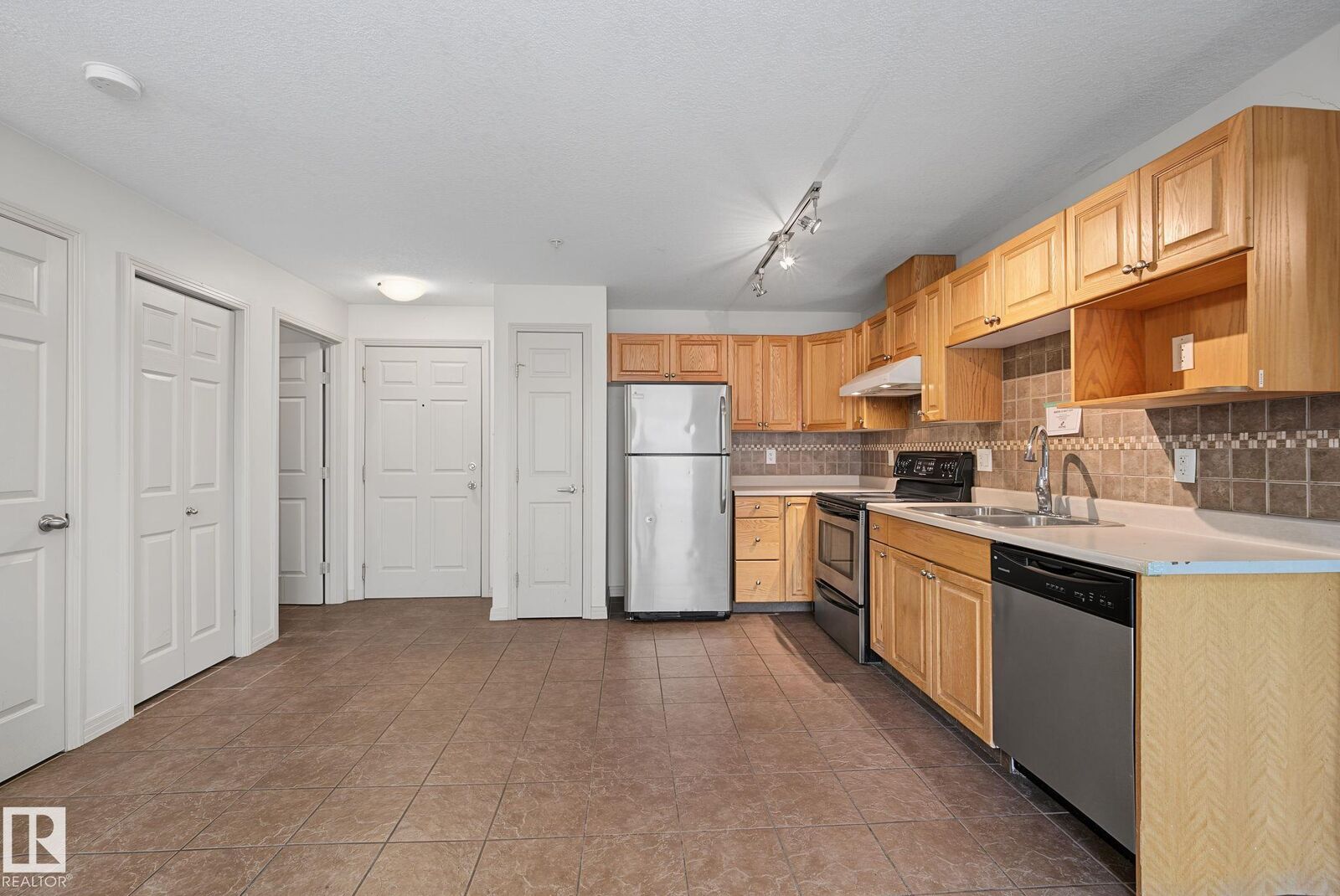 Property Photo: 5005 165 Avenue NW 111 AB T5Y 0L8
