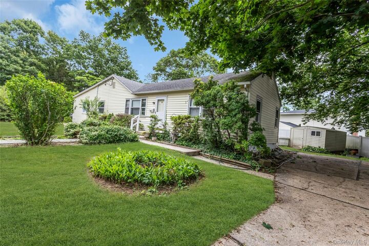 Property Photo:  26 Woodland Street  NY 11779 