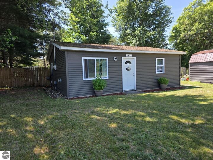 Property Photo:  8937 Valley Road, NW  MI 49646 