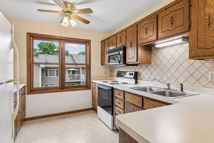 Property Photo:  1799 1/2 County Road E E 30  MN 55110 