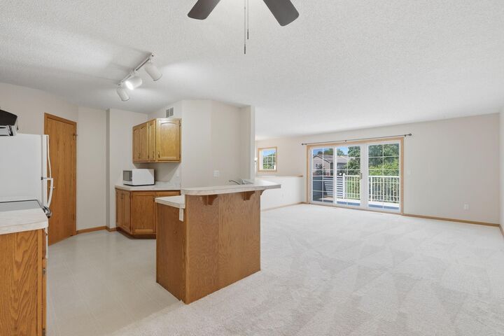 Property Photo:  2213 E 117th Street  MN 55337 
