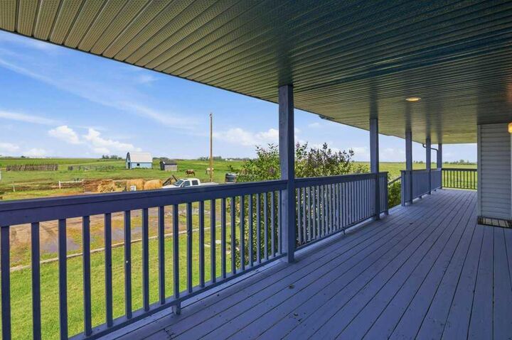 Property Photo: 270127 Glenmore Trail AB T0J 1X0