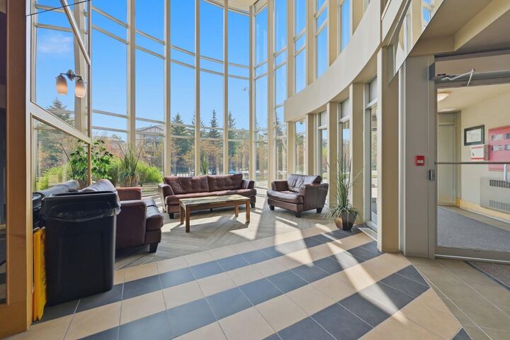 Property Photo:  11811 Lake Fraser Drive SE 5605  AB T2J 7J4 