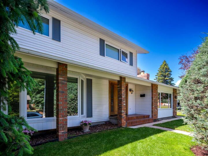Property Photo: 10723 Maplebend Drive SE AB T2J 1X3
