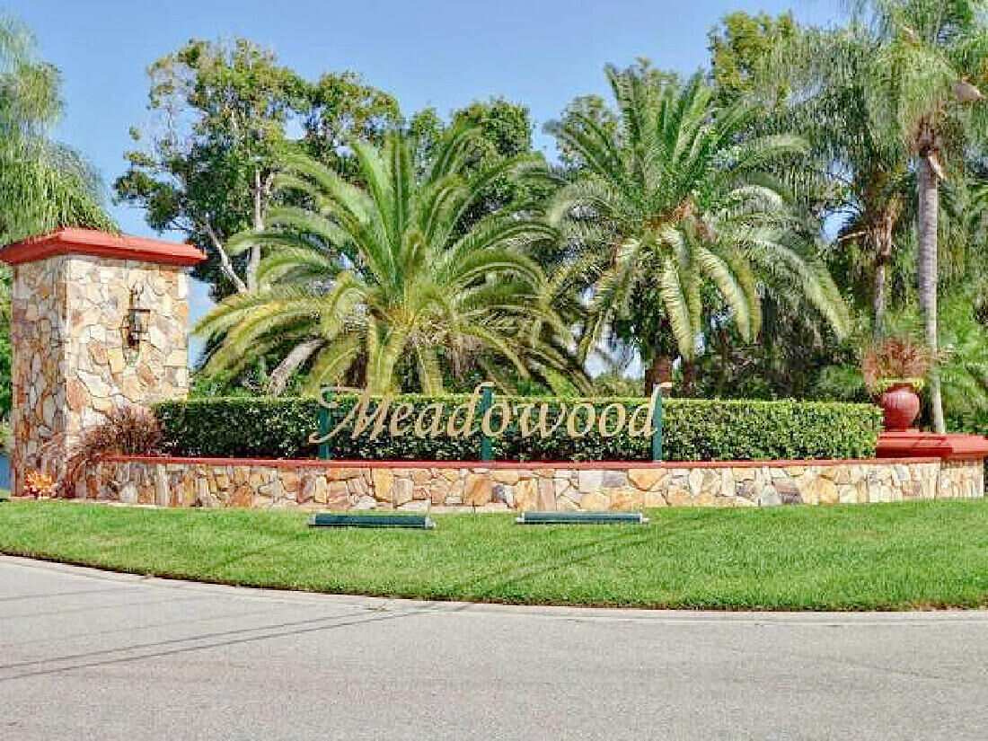 Property Photo:  9460 Meadowood Drive 104  FL 34951 
