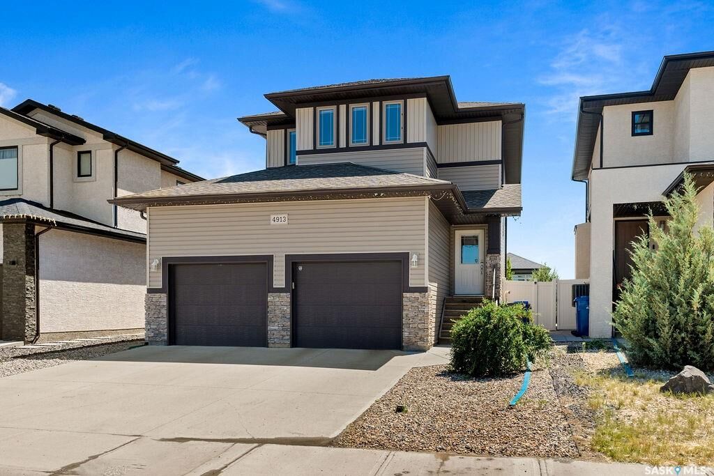 Property Photo:  4913 Green Brooks Way E  SK S4V 3K5 