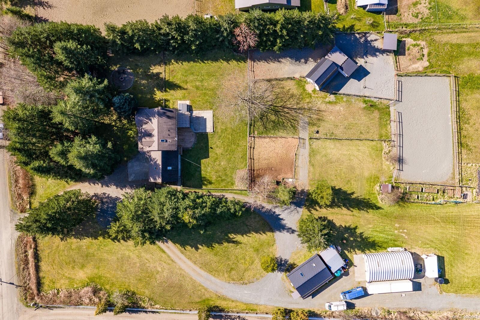 Property Photo:  6104 Ledingham Rd  BC V9J 1M9 