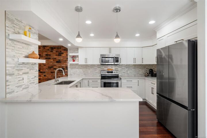 Property Photo: 4682 Lochside Dr BC V8Y 2X7