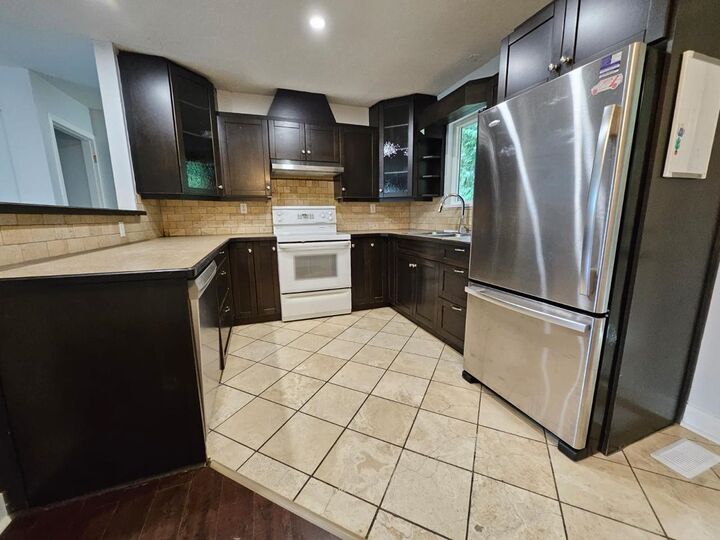Property Photo:  15118 91A Avenue  BC V3R 6X1 