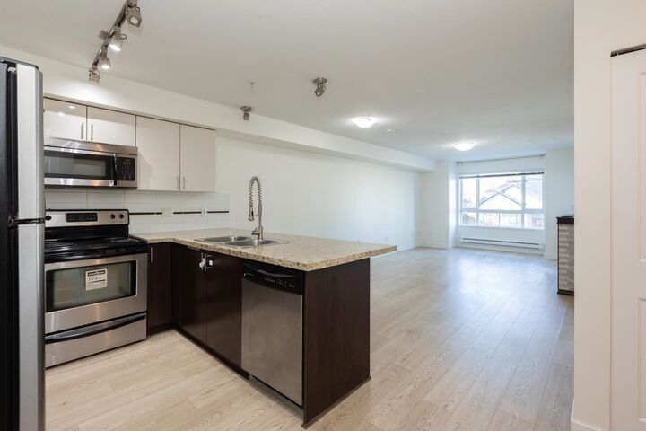 Property Photo:  14960 102A Avenue 202  BC V3R 6A3 