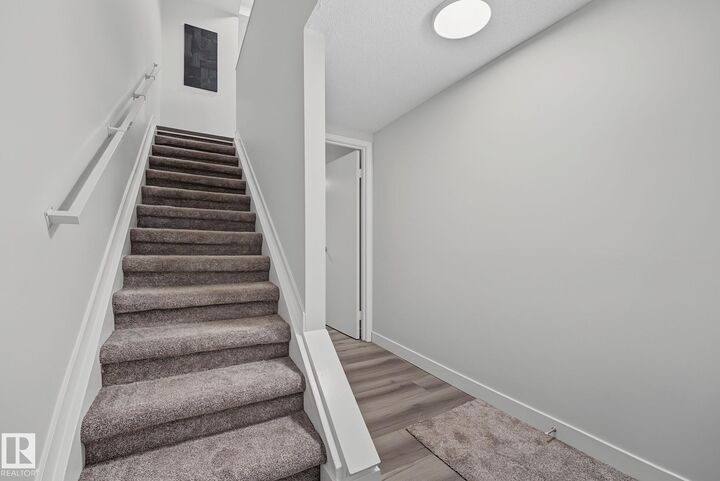 Property Photo:  661 Abbottsfield Road NW  AB T5W 4R4 