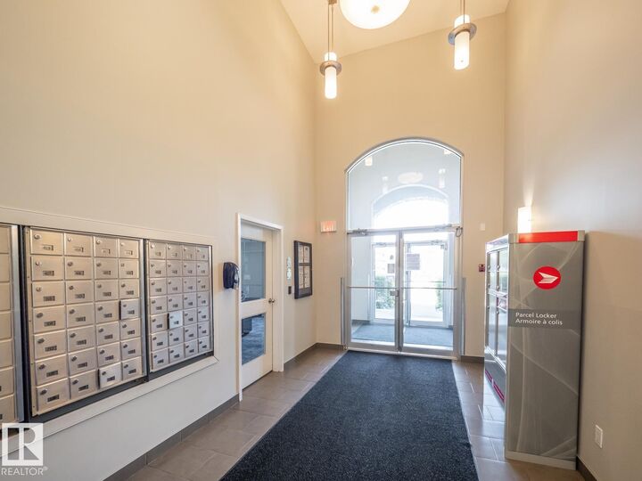 Property Photo: 392 Silverberry Road NW 216 AB T6T 0H1