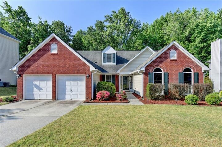 Property Photo:  1396 Belfaire Trace  GA 30019 