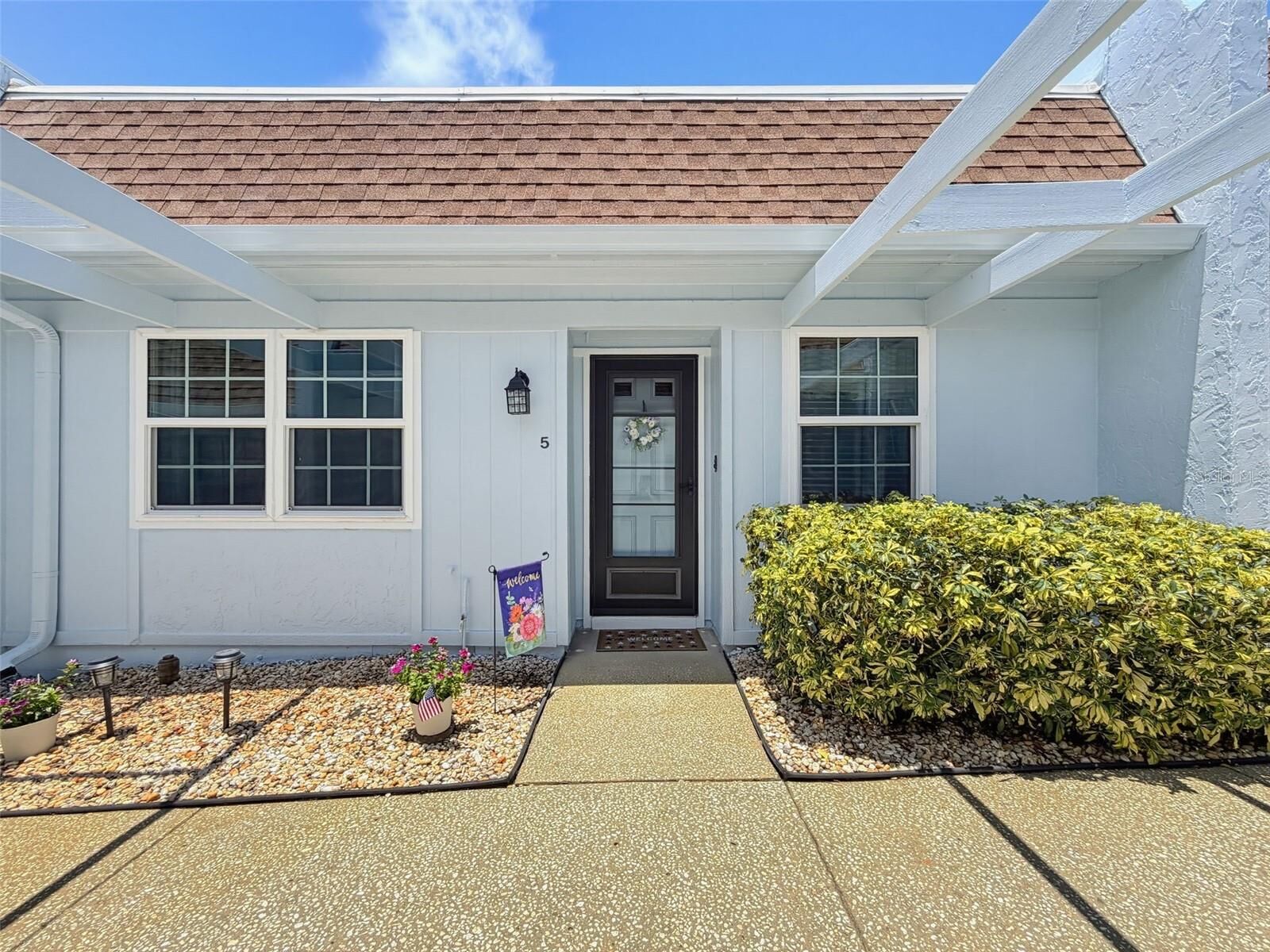 Property Photo:  8220 Seven Oaks Court 5  FL 34668 