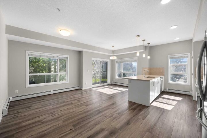 Property Photo: 360 Harvest Hills Common NE 107 AB T3K 2N1