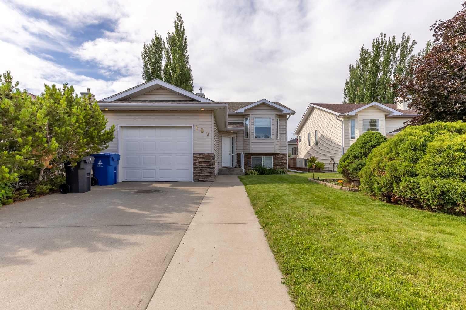 Property Photo:  187 Cougar Way N  AB T1H 6P4 