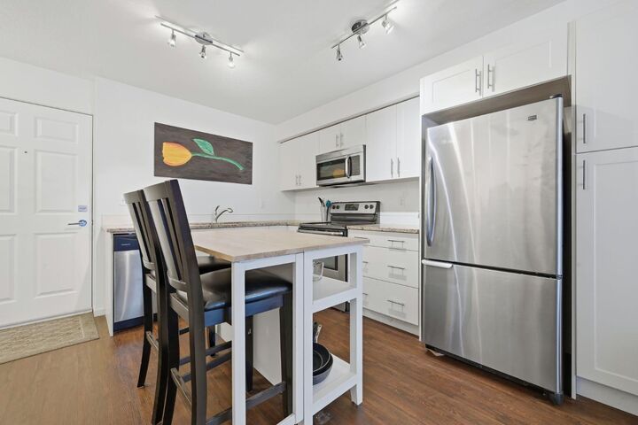 Property Photo: 755 Copperpond Boulevard SE 3315 AB T2Z 4R2
